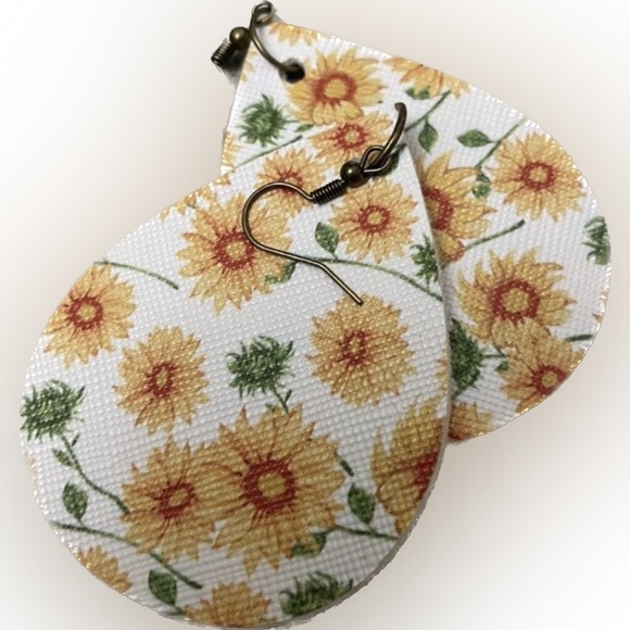 Misfit Junction Jewelry - Large Tear Drop Earrings Handmade in Tennessee.

Flower print on both sides